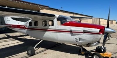 Cessna 210 Press.